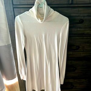 Ivory mid length long sleeve dress with turtle neck. Size small